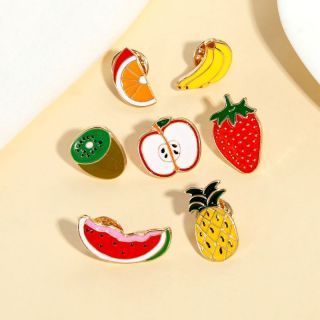 Custom fruit-themed badges